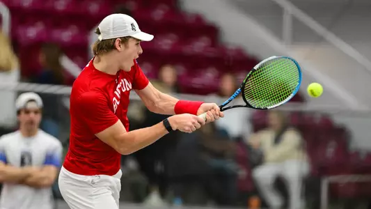 Cole Knutsen Hitting A Tennis Ball
