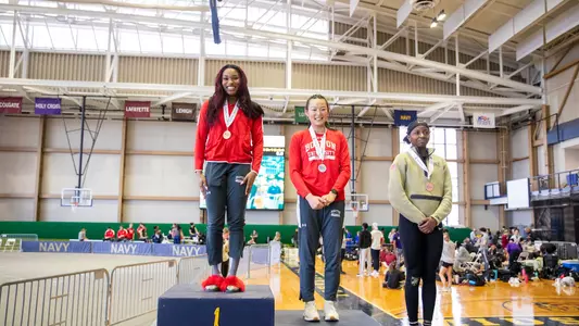 Peace Omonzane and Jamie Chamberlain Earning Medals
