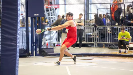 Luke Riordan Throwing a Weight
