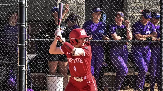 Brooke Deppiesse is at home plate with a bat waiting for the pitch to be thrown.