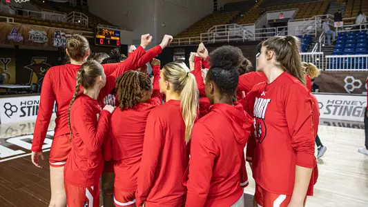 Photo of the BU women's basketball team huddling up before its game against Lehigh.