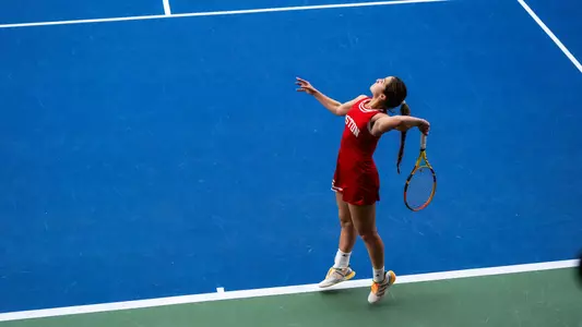 Gabriella Mikaul Hitting a Serve