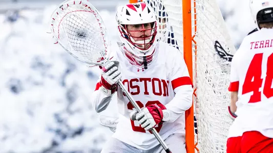 Will Barnes playing lacrosse