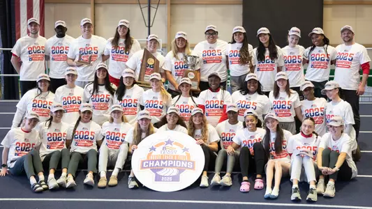 Women's Track and Field poses with the trophy for the Patriot League Championship