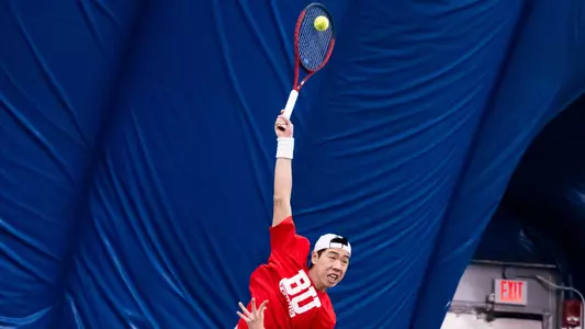 Jaydon Barki Hitting a Tennis Ball
