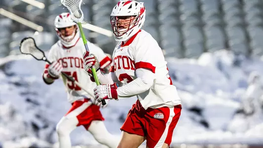 Madden Murphy playing lacrosse