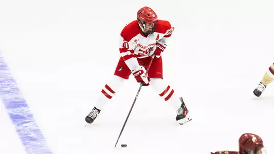 Julia Shaunessy playing hockey against BC