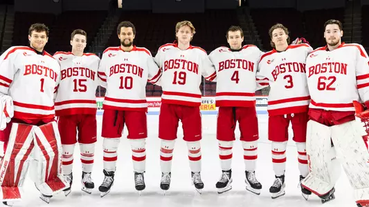 2024-25 BU men's ice hockey seniors and graduate students posing together