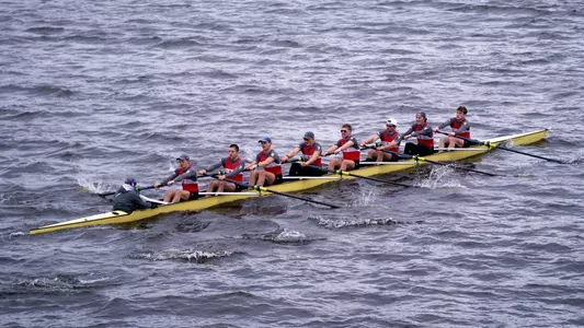 Photo of the Men's Rowing Fourth Varsity 8+ racing on the Charles River.