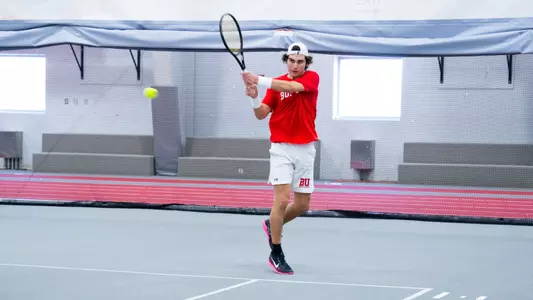 Ege Topkoc hitting a shot