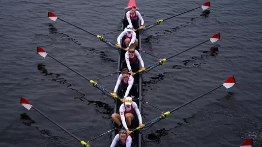 Photo of a Lightweight Rowing 8 racing on the Charles River.