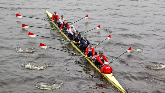 Photo of the BU Men's Rowing Second Varsity 8 on the Charles River.