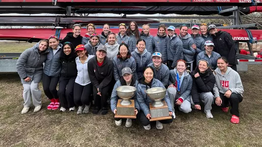 Team photo of Lightweight Rowing with their Knecht Cup trophies.