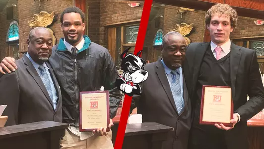Malcolm Chimezie and Nico Nobili both earned the Reggie Stewart Award and pose for a photo individually with assistant coach Curtis Wilson