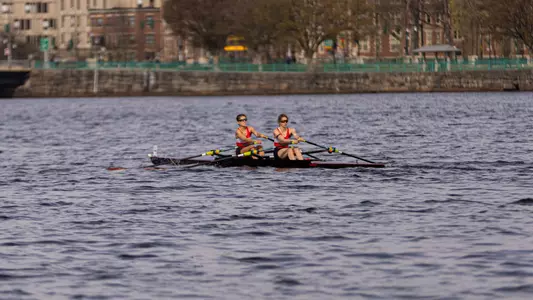 Photo of the BU Lightweight Rowing 2x racing on the Charles River