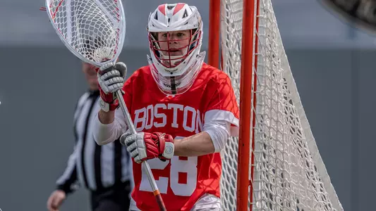 Will Barnes playing lacrosse