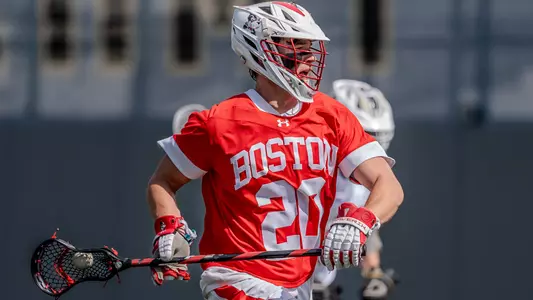 Luke Davis playing lacrosse