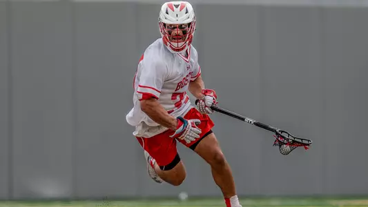 Benjamin Ferrara playing lacrosse