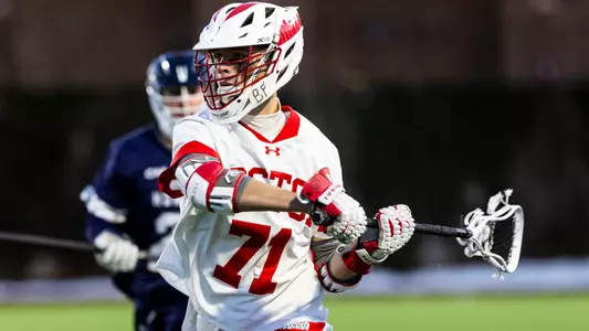 Tyler Fox playing lacrosse