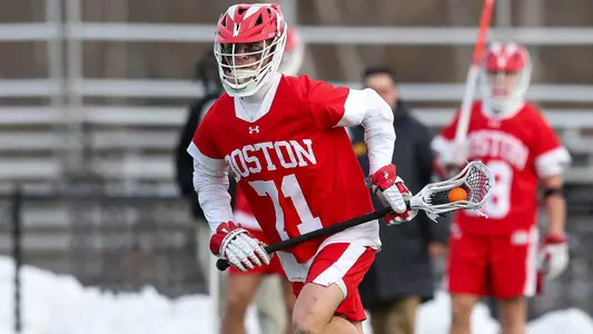 Tyler Fox playing lacrosse