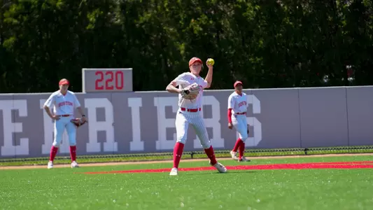 Softball Outfielders going through catching and throwing drills