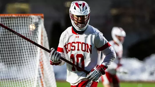 Colby Kim playing lacrosse