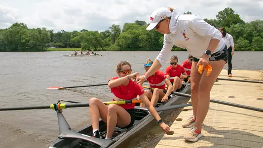 Photo of the BU Lightweight Rowing 4+ launching at the IRA Championship
