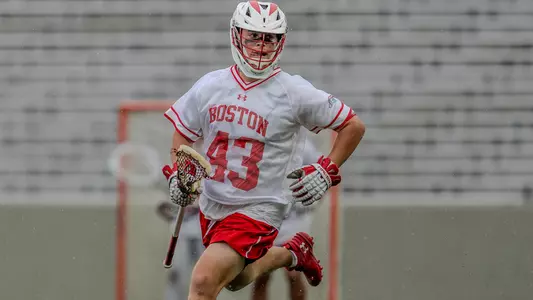 Daine Kostes playing lacrosse