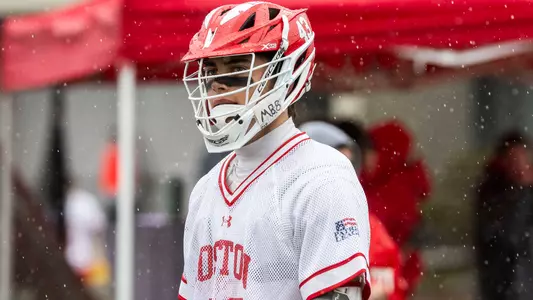 Daine Kostes looking at the lacrosse field