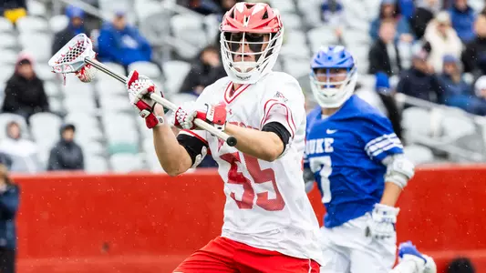 Mike Luce playing lacrosse