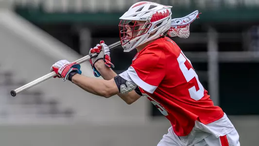 Mike Luce playing lacrosse