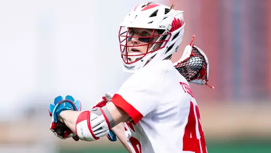 Jackson Matthews playing lacrosse