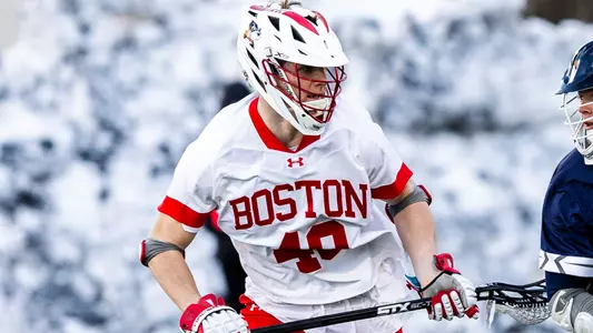 Jackson Matthews playing lacrosse