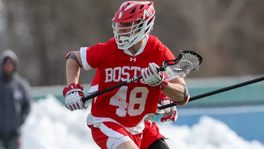 Jackson Matthews playing lacrosse