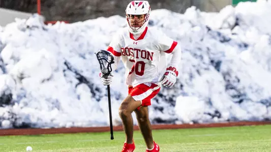 Simon Miklaszewski playing lacrosse