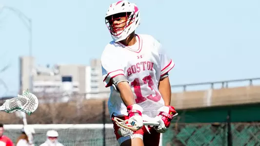 Tre Moore playing lacrosse