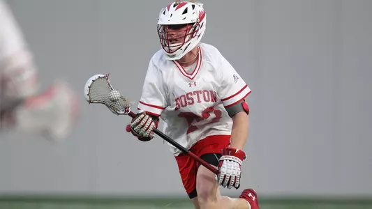 Madden Murphy playing lacrosse