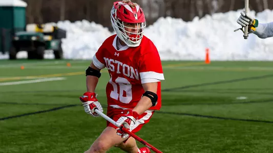 Logan Styles playing lacrosse