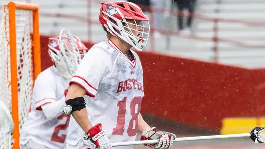 Logan Styles playing lacrosse