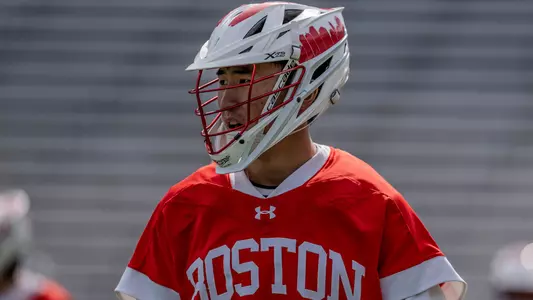 Kaidan Suh walking onto the lacrosse field at Army West Point