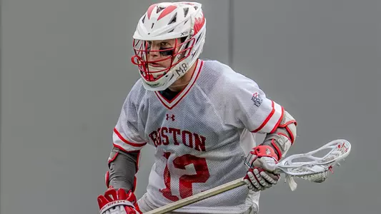 Zach Travaglini playing lacrosse