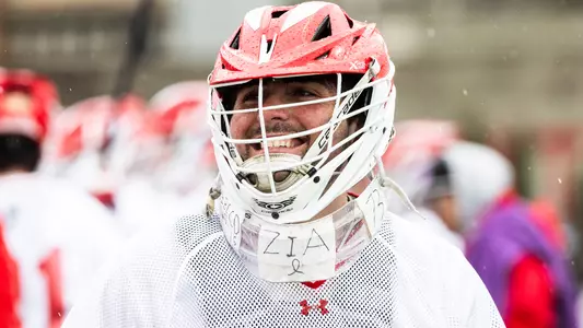 Michael Allieri smiling on the sideline