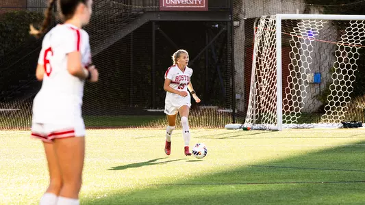 Photo of women's soccer sophomore Alli Powderly dribbling the ball at Nickerson Field.
