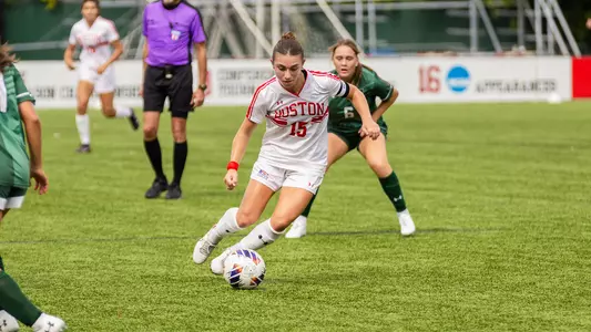 Photo of BU women's soccer senior Giulianna Gianino dribbling the ball at Nickerson Field.
