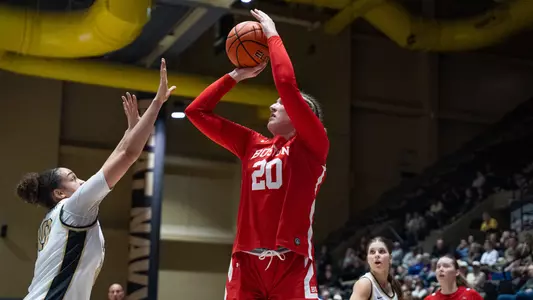 Photo of women's basketball senior Anete Adler shooting a jumper at Army West Point.