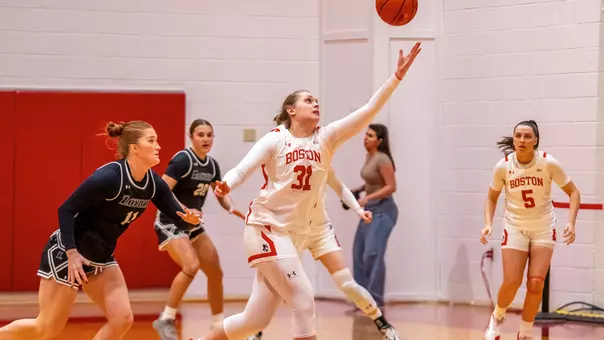 Photo of BU women's basketball senior Anastasiia Semenova catching a pass at Case Gym.