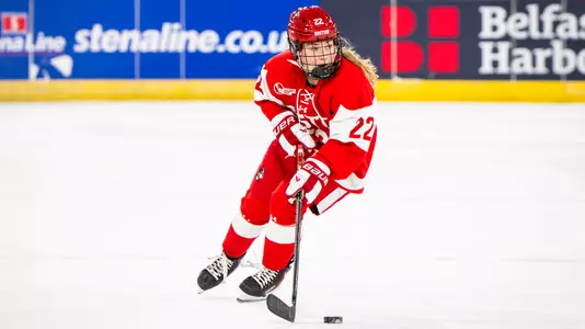 Lexie Bertelsen playing hockey in Belfast