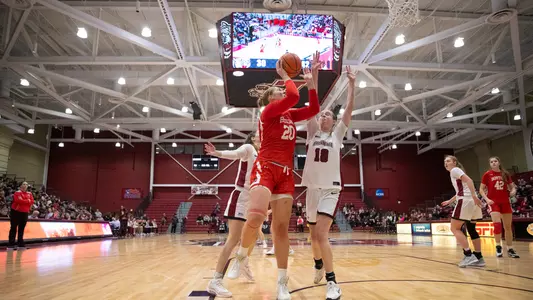 Photo of women's basketball senior Anete Adler shooting a layup at Lafayette.