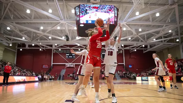 Photo of women's basketball senior Anete Adler shooting a layup at Lafayette.