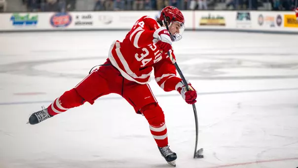 Cole Eiserman shoots the puck during a game at Providence